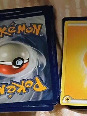 Pokémon Trading Card Lot with Yellow Energy Card